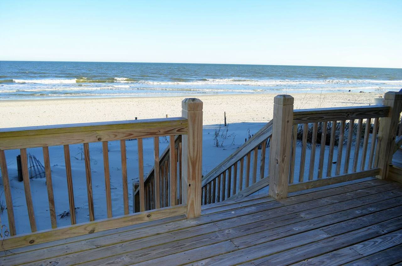 Steps Away from the Sandy Beaches of Garden City Steps Away from the Sandy Beaches of Garden City