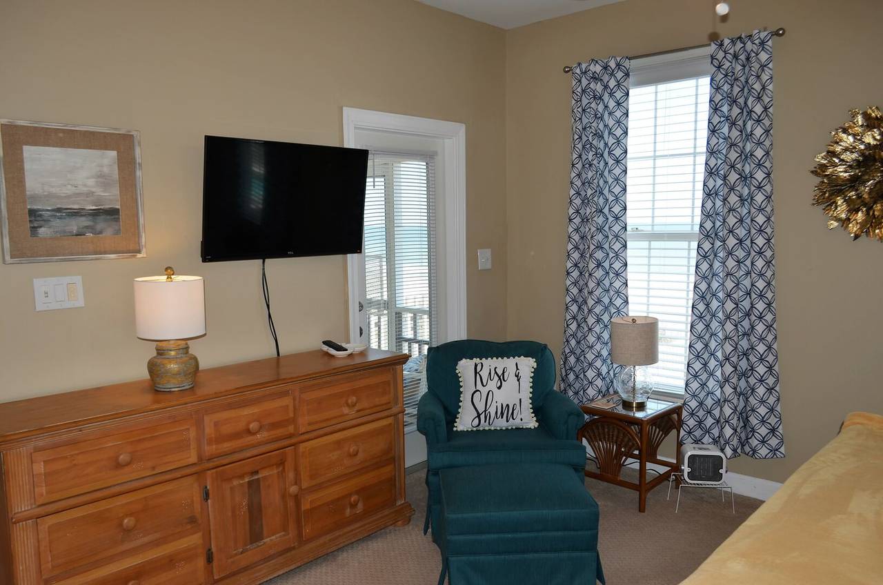 Watch TV from the comfort of bed Watch TV from the comfort of bed