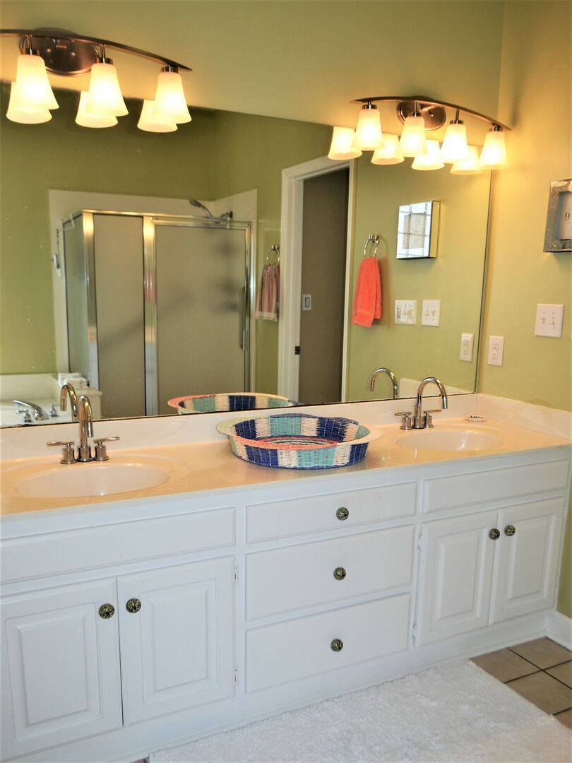 featuring a double vanity, featuring a double vanity,