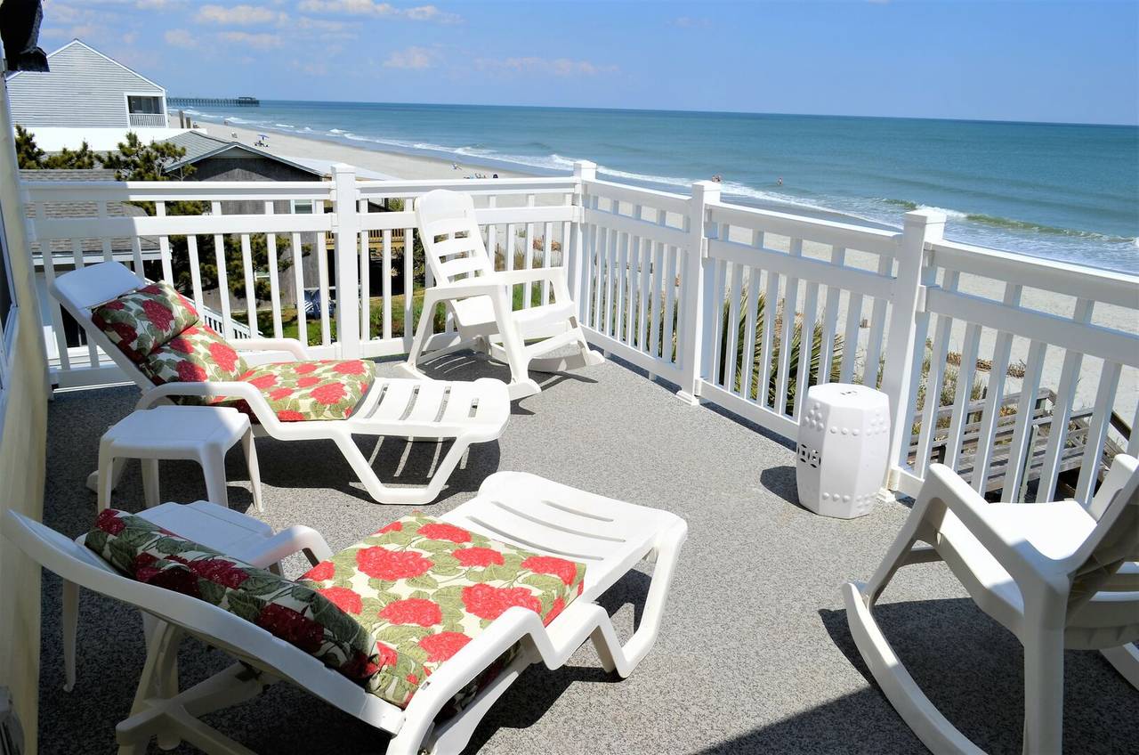 Upstairs features a sundeck with views of Garden City Pier Upstairs features a sundeck with views of Garden City Pier