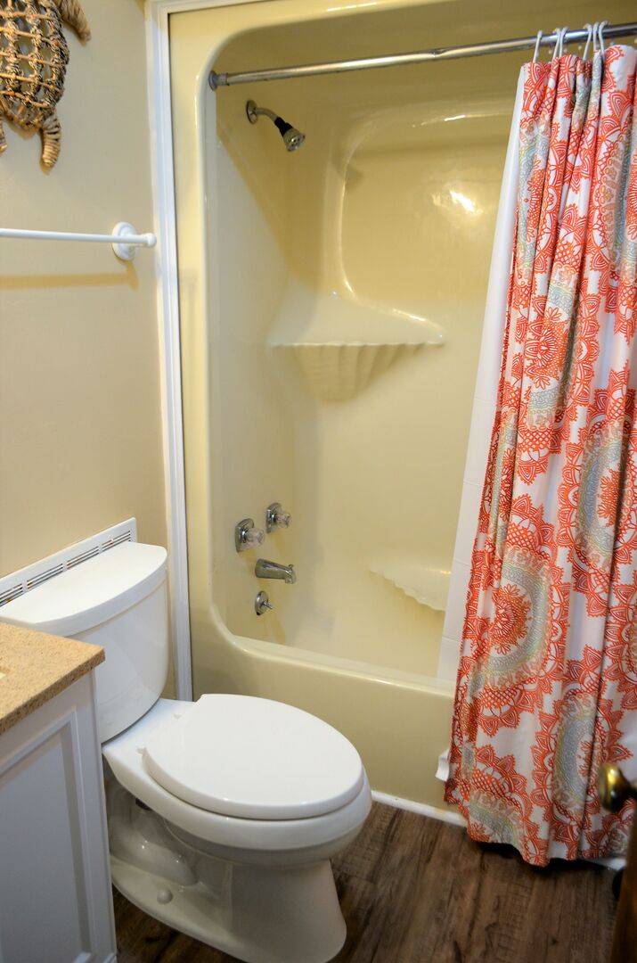 with a shower/tub combo. with a shower/tub combo.