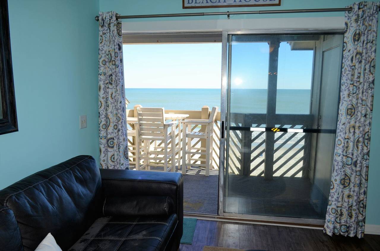 Head outdoors to the private balcony. Head outdoors to the private balcony.