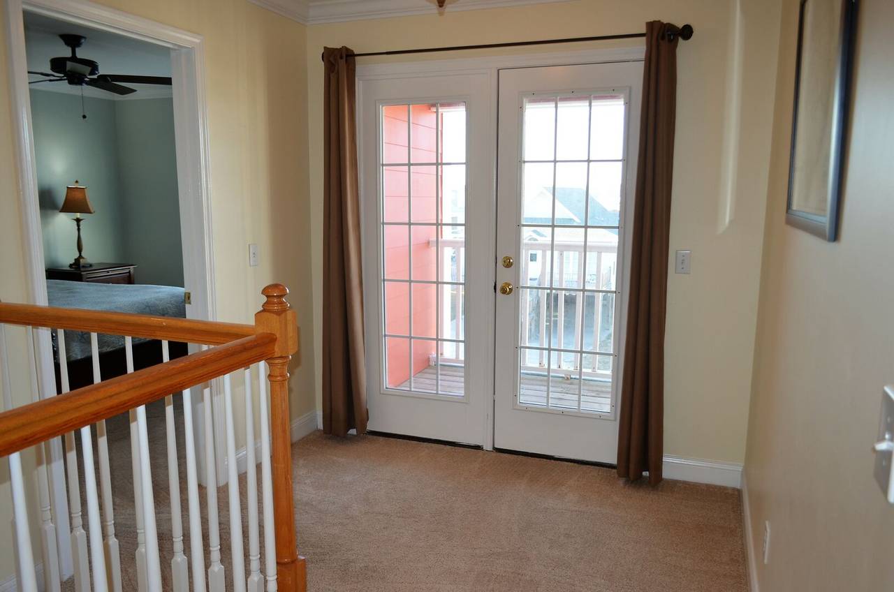 Step out onto the street side balcony. Step out onto the street side balcony.