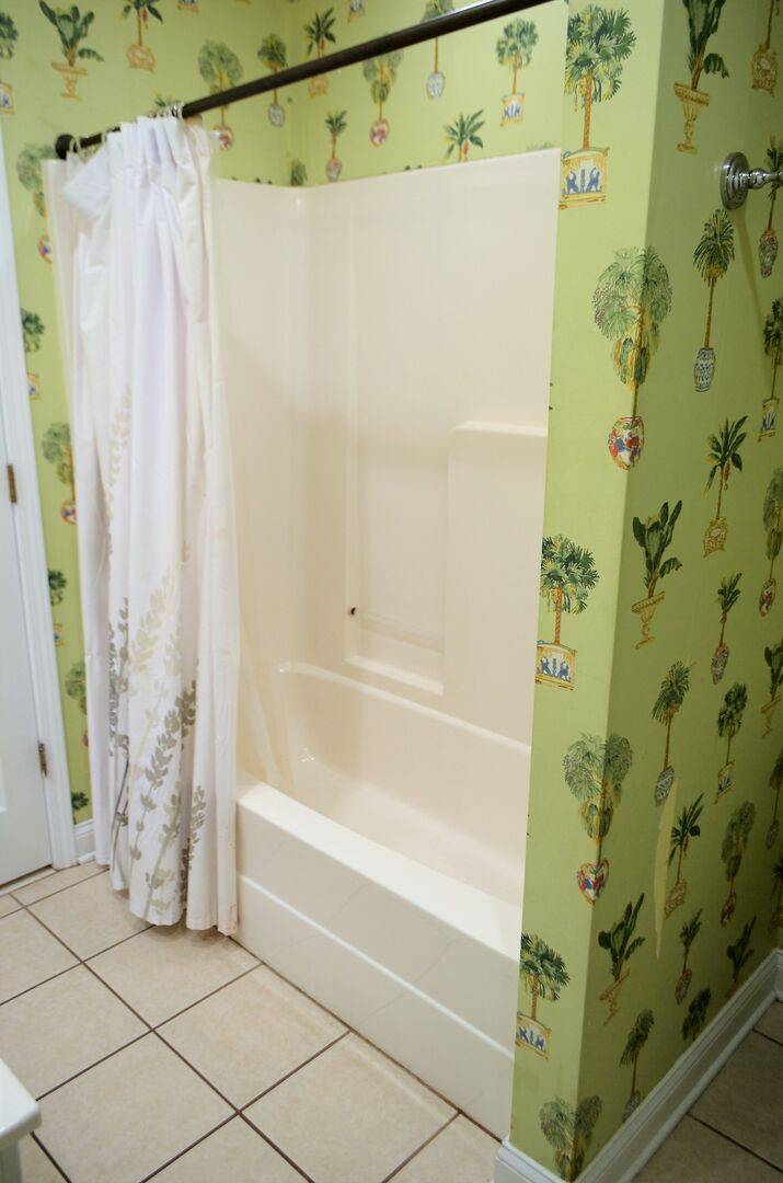 Jack & Jill Bath has a double sink vanity and a shower/tub combo. Jack & Jill Bath has a double sink vanity and a shower/tub combo.