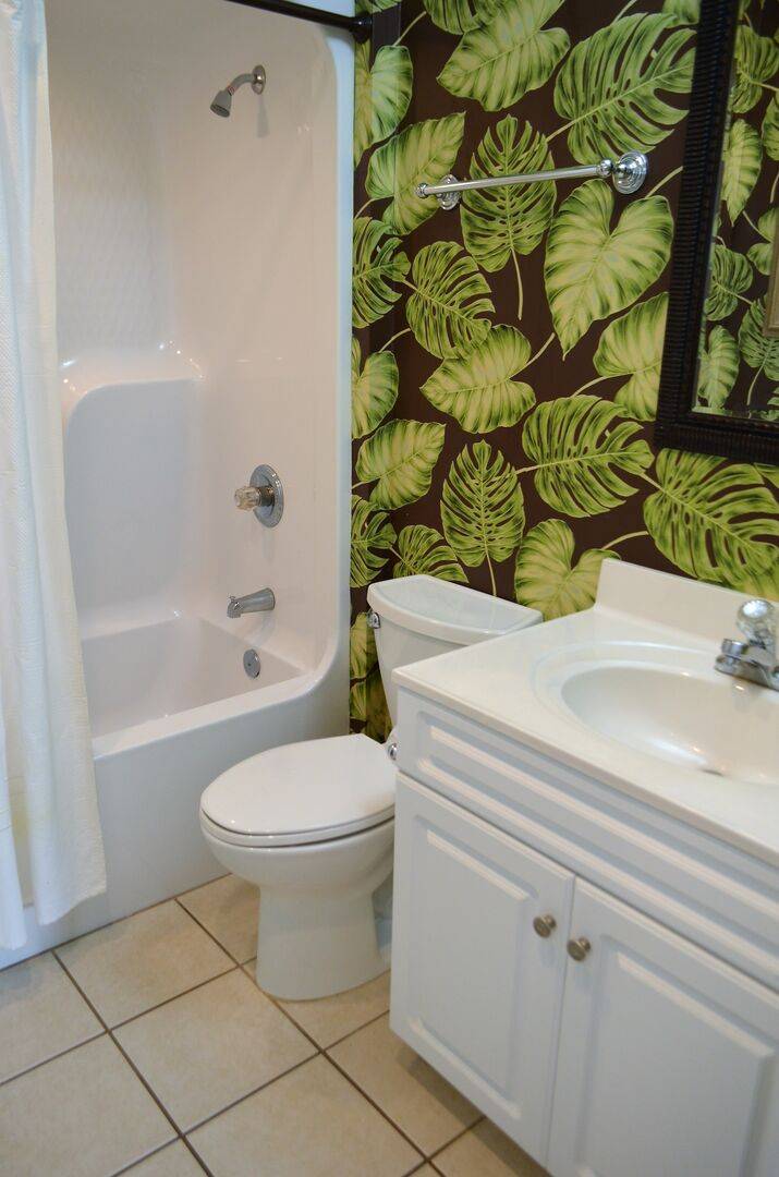 Private bathroom has a single vanity & shower/tub combo. Private bathroom has a single vanity & shower/tub combo.
