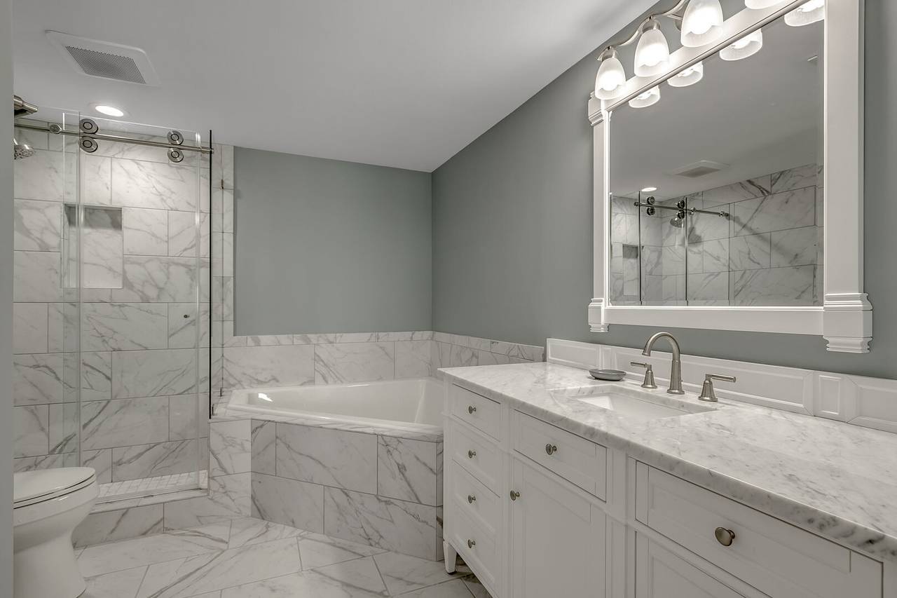 Bedroom 3 Bathroom with Garden Tub & Walk-In Shower Bedroom 3 Bathroom with Garden Tub & Walk-In Shower