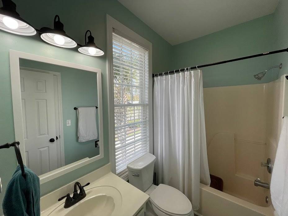 Bath 1 down - accessed off of hallway and Bedroom 1 Bath 1 down - accessed off of hallway and Bedroom 1