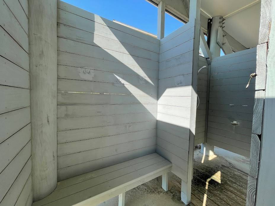 Enclosed outside shower and changing area Enclosed outside shower and changing area