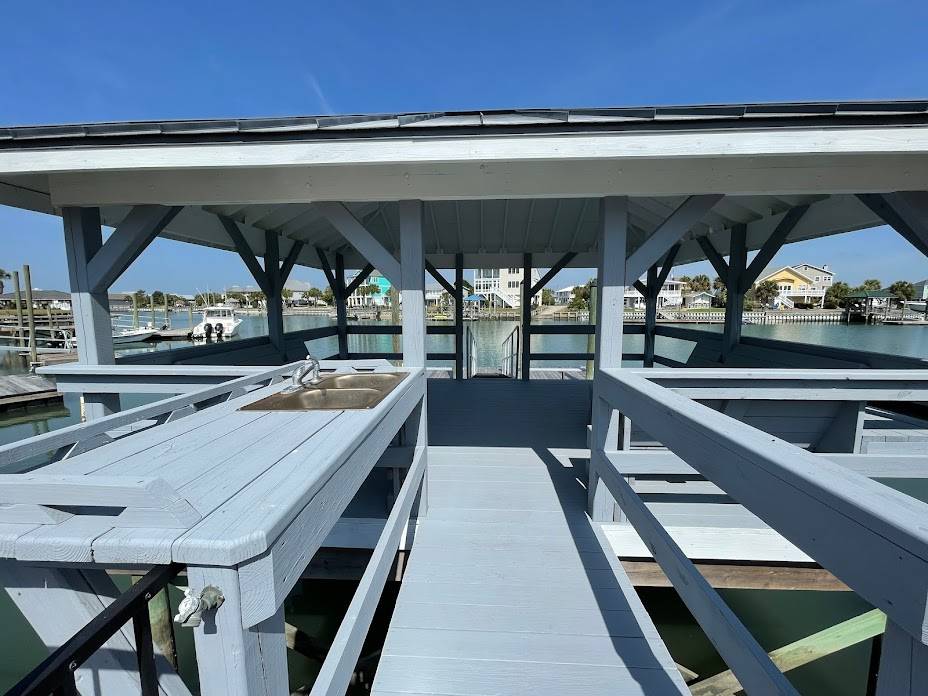 Covered gazebo with seating and sink (no running water) Covered gazebo with seating and sink (no running water)