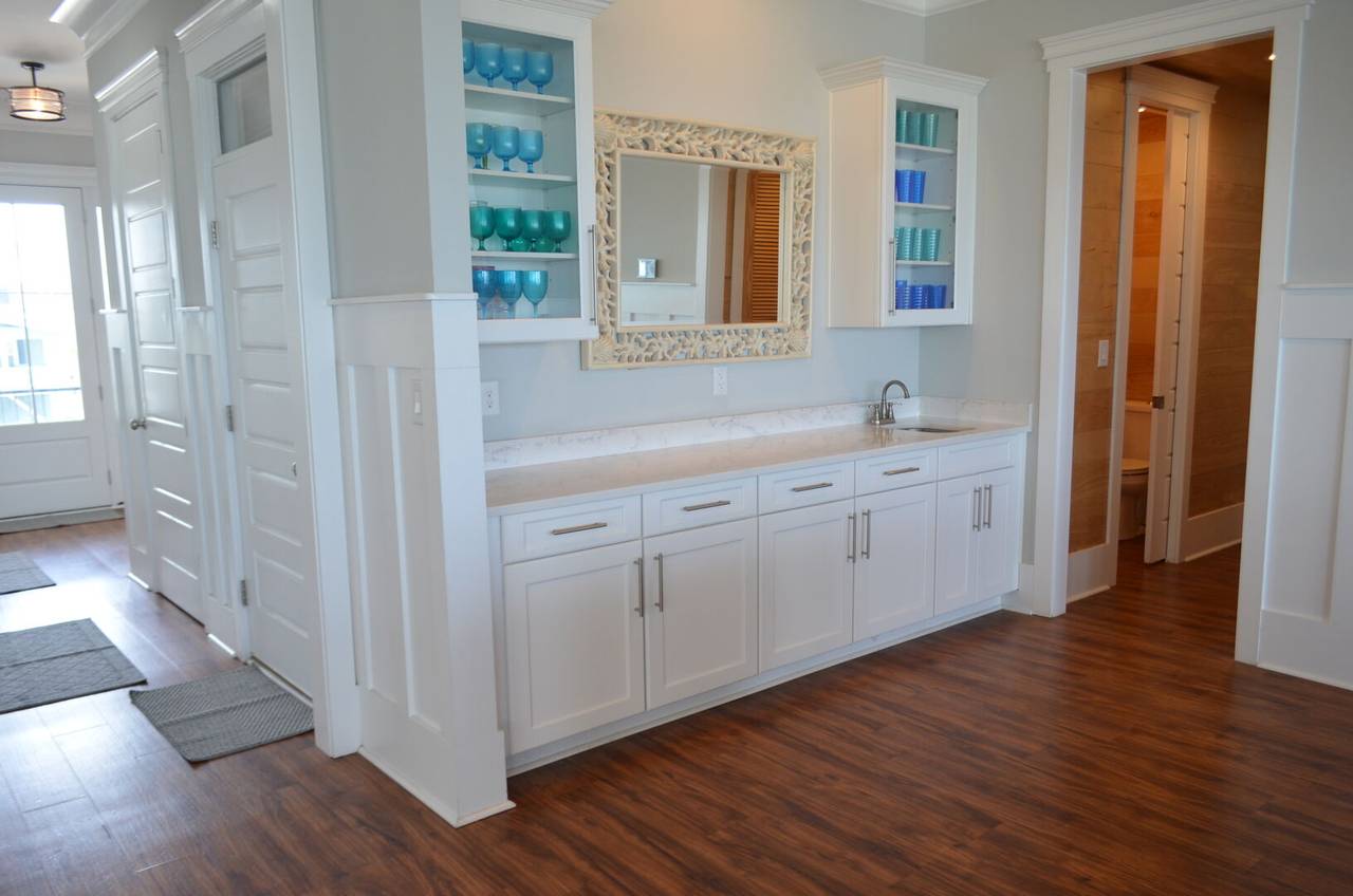 Wet bar, half bath and laundry located downstairs Wet bar, half bath and laundry located downstairs