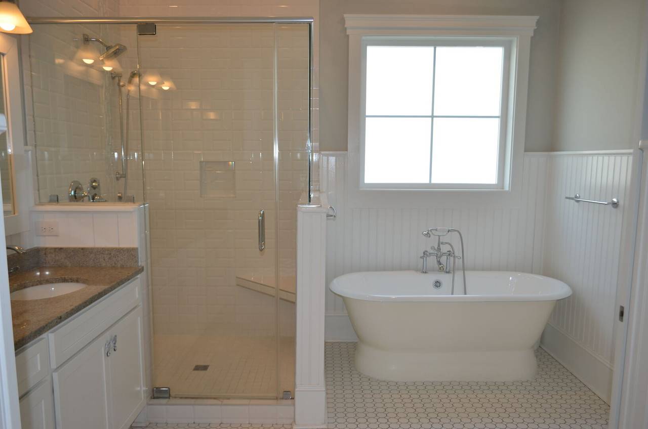 Bedroom 1 bath with walk-in shower and freestanding tub Bedroom 1 bath with walk-in shower and freestanding tub