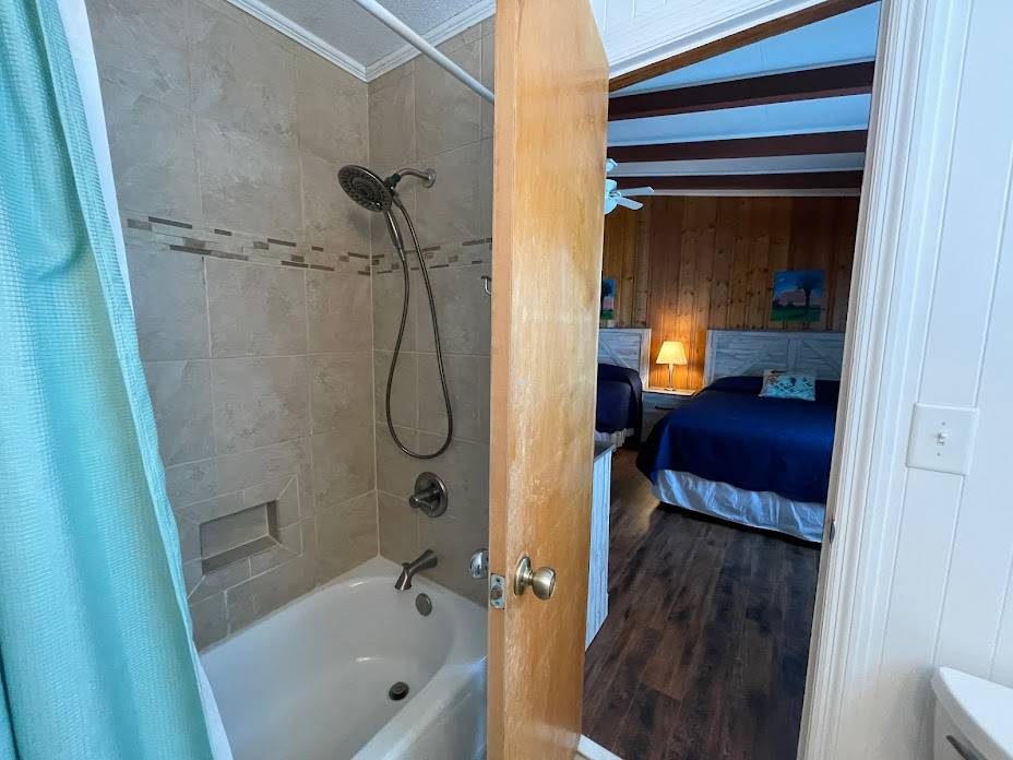 Shared bath between Bedrooms 1 and 2. Tub/shower combo Shared bath between Bedrooms 1 and 2. Tub/shower combo