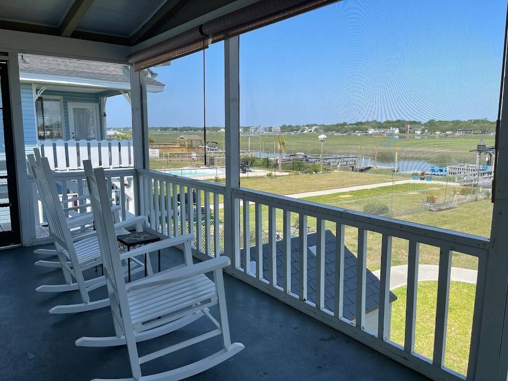 Screen porch with inlet view Screen porch with inlet view