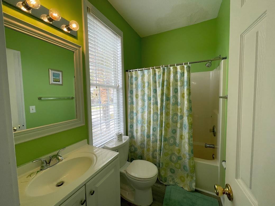 Bath 1 down with hall and Bedroom 1 access Bath 1 down with hall and Bedroom 1 access