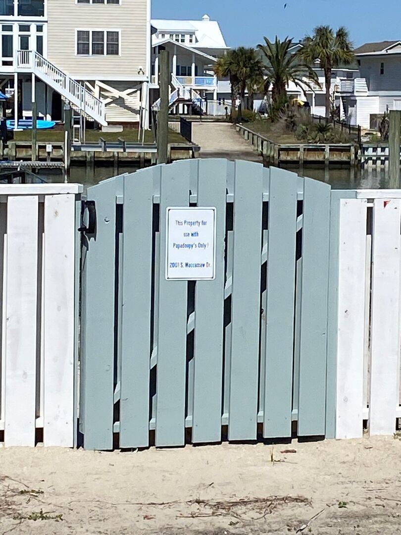 Gate to floating dock across the street Gate to floating dock across the street