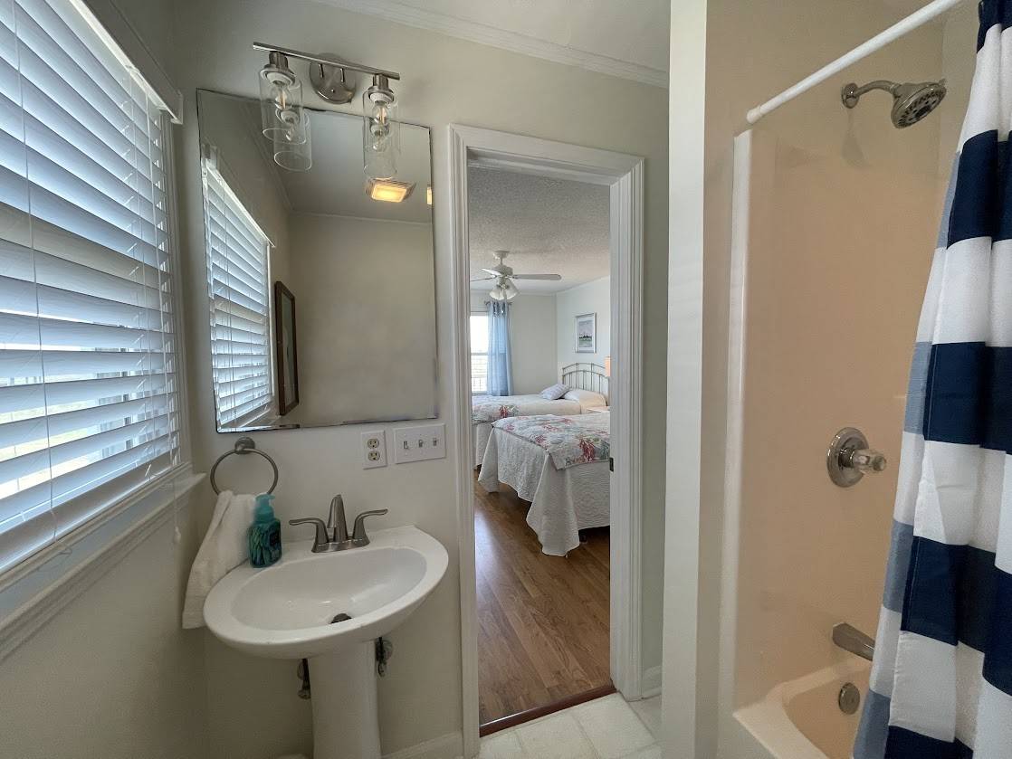 Private bath off of bedroom 3 Private bath off of bedroom 3