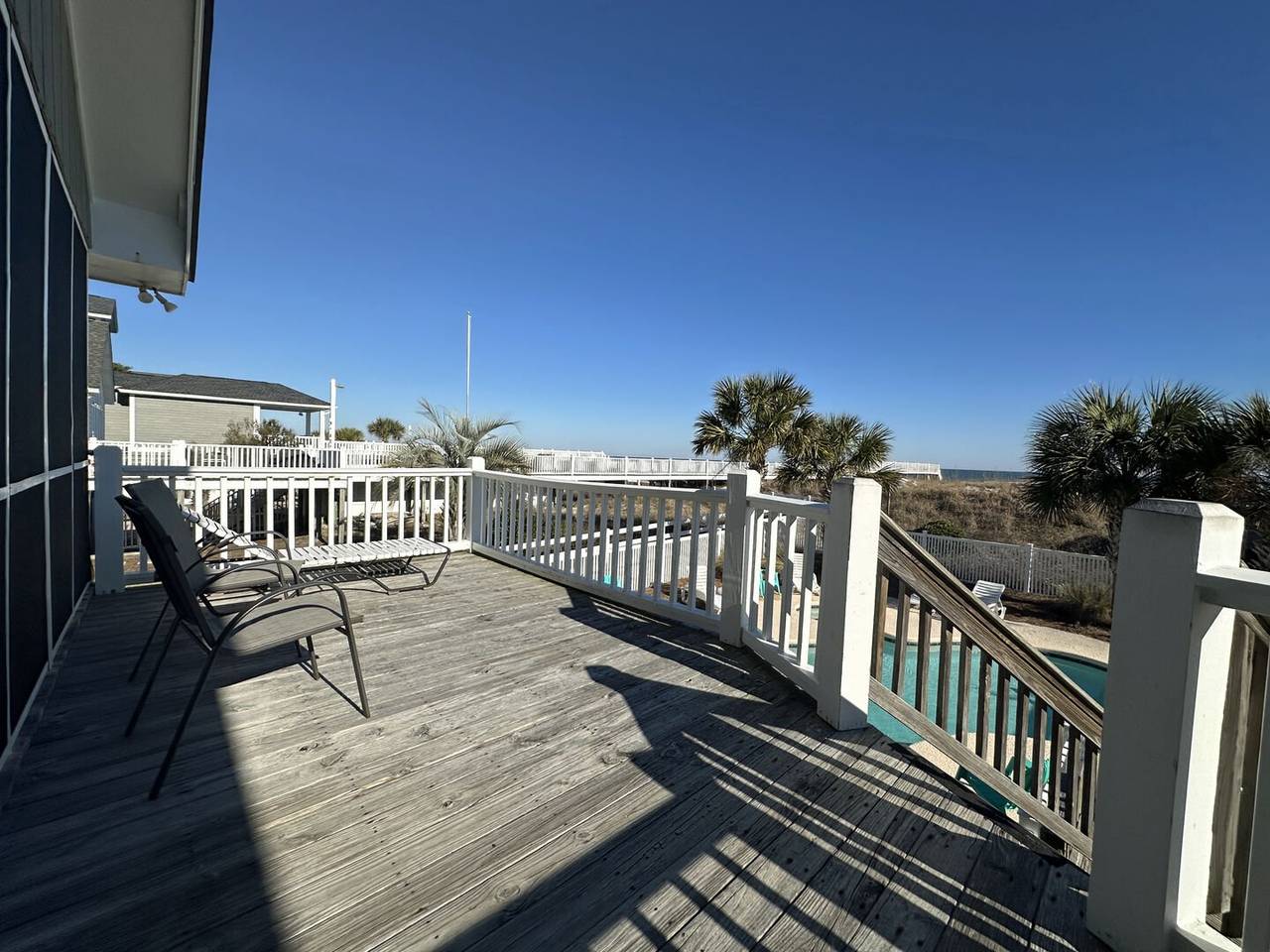 Uncovered Porch Area Overlooking the Pool Uncovered Porch Area Overlooking the Pool