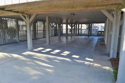 Parking Under House (now includes hot tub) Parking Under House (now includes hot tub)