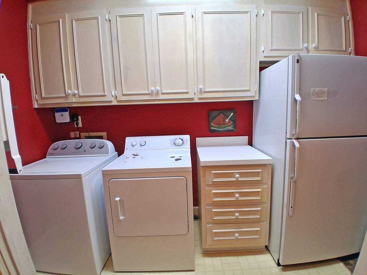 Laundry Area With Additional Refrigerator Laundry Area With Additional Refrigerator