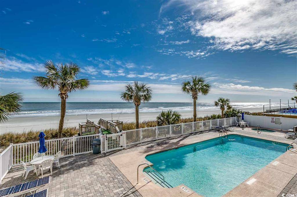 Head down to the beach using the convenient walkway. Head down to the beach using the convenient walkway.