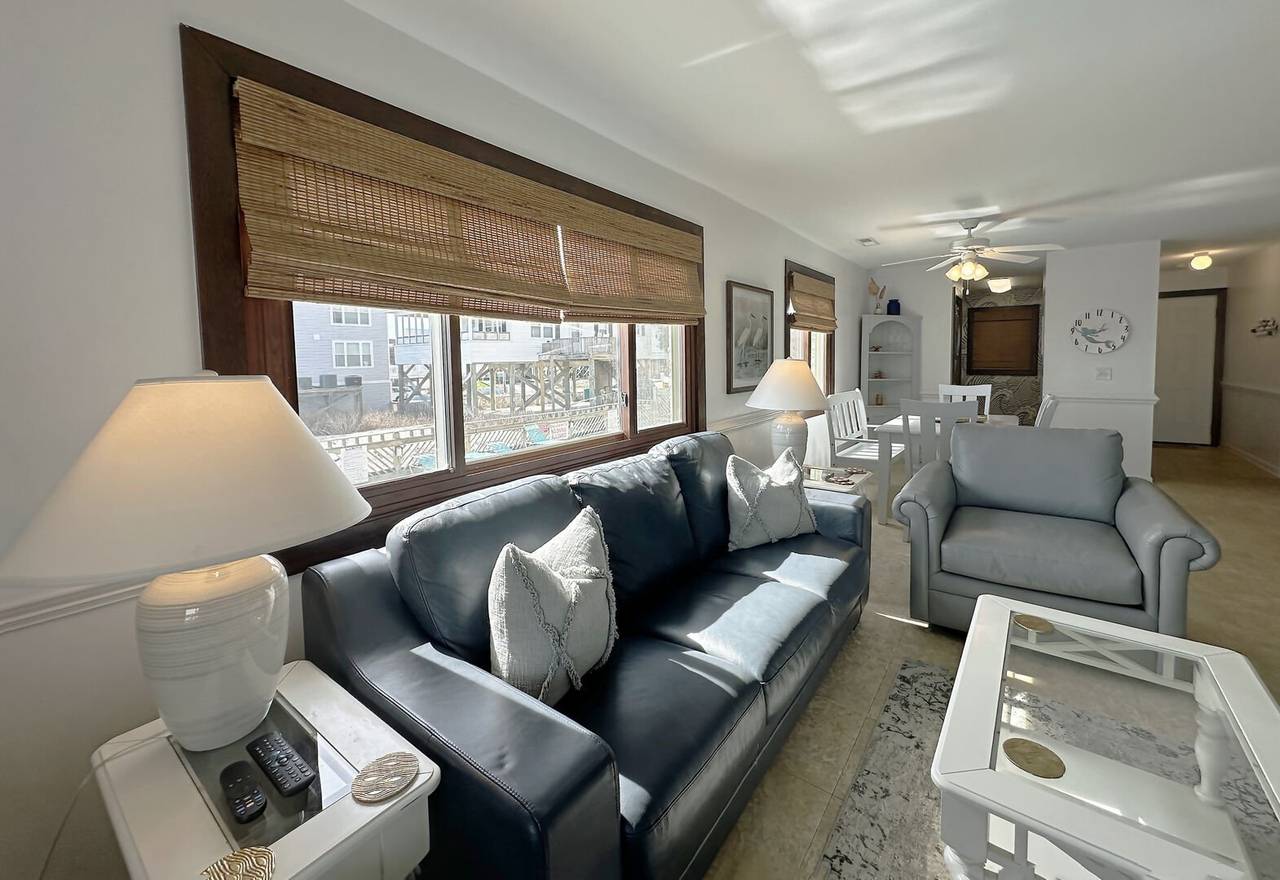 Overlooks the community pool. Overlooks the community pool.