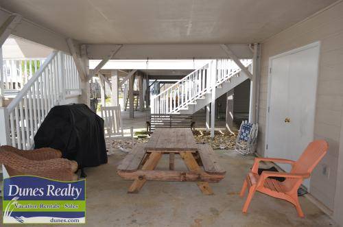 Seating & grill under house Seating & grill under house