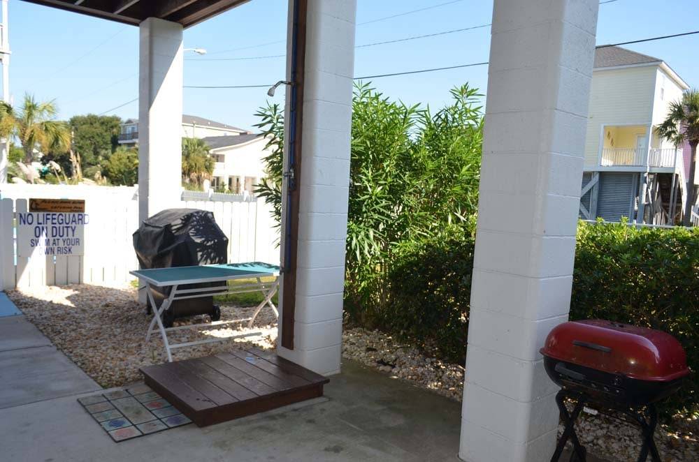 Outside shower, gas & charcoal grills Outside shower, gas & charcoal grills