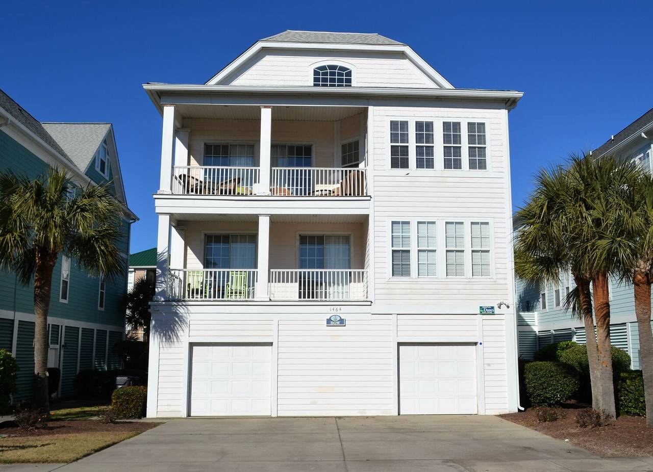 Street Side Exterior with 2 Covered Porches and 2 Garage Bays Street Side Exterior with 2 Covered Porches and 2 Garage Bays