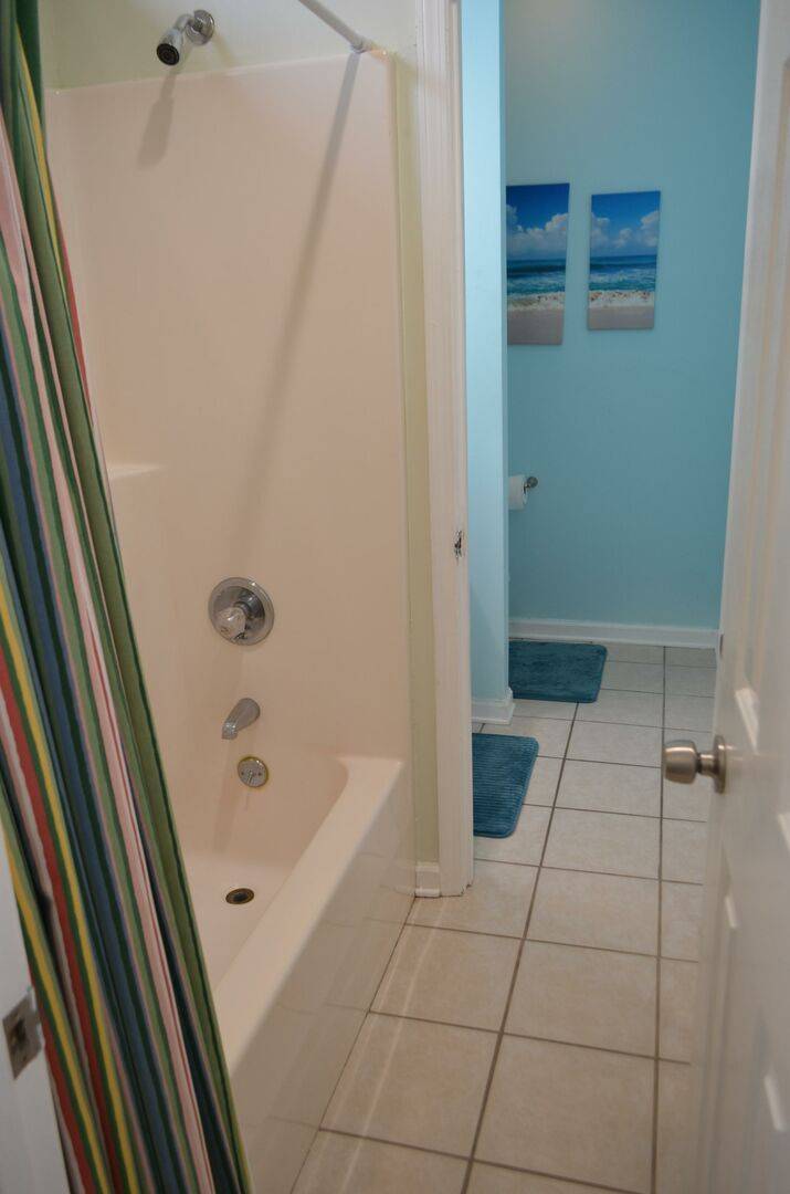 and shared shower/tub combo with Bedroom 3. and shared shower/tub combo with Bedroom 3.