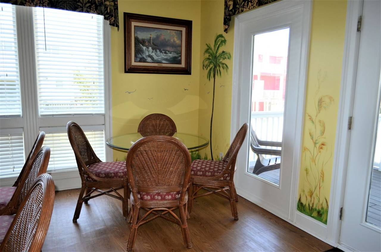 2 tables in the dining area plus extra bar seating 2 tables in the dining area plus extra bar seating