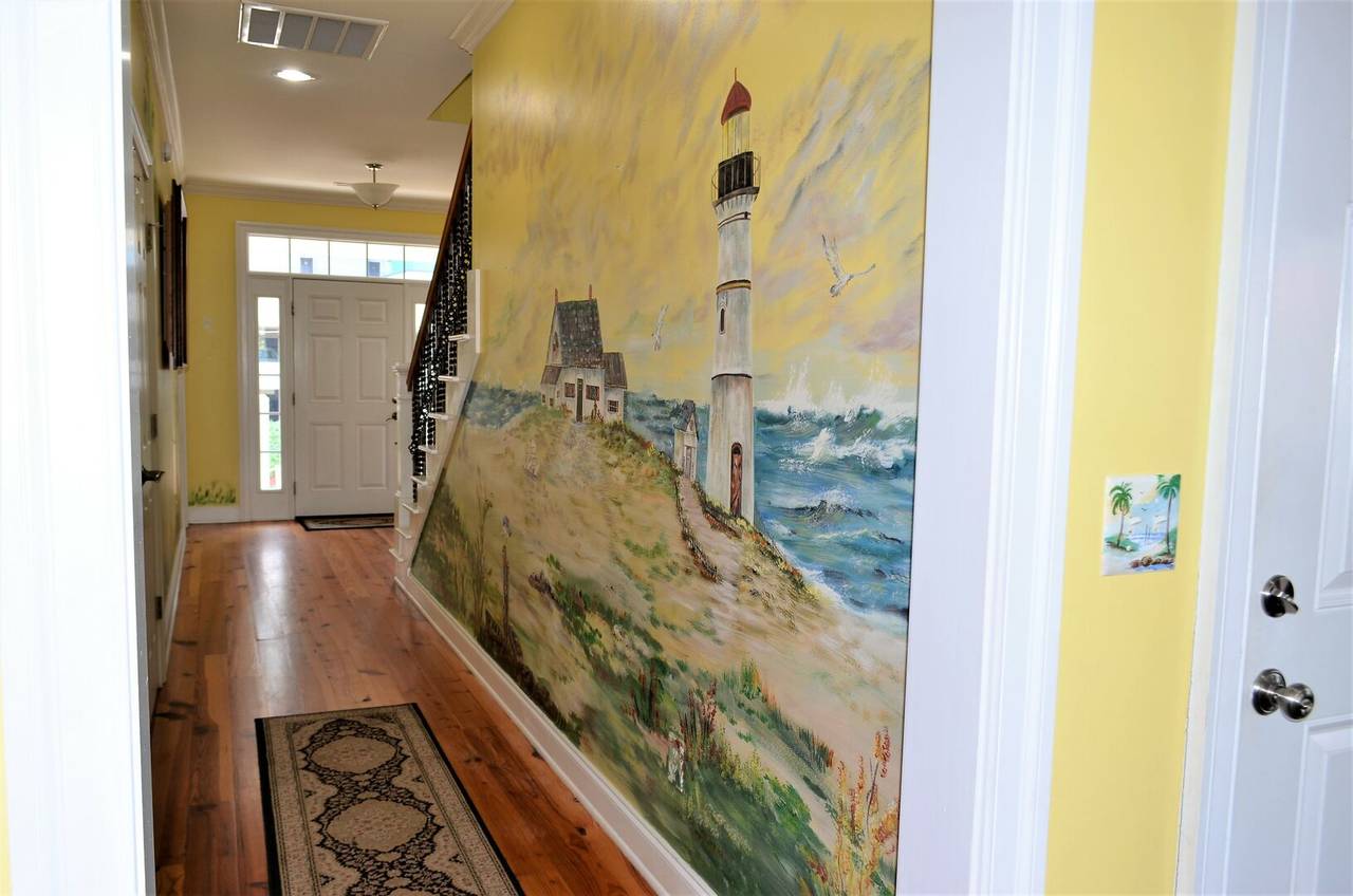 Hallway to 2 downstairs bedrooms Hallway to 2 downstairs bedrooms