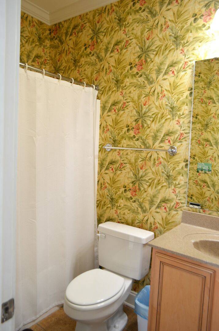 with a shower/tub combo with a shower/tub combo