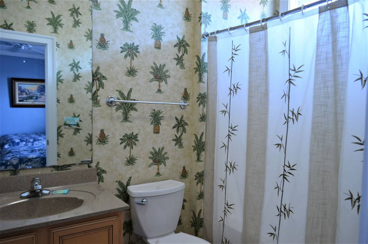 Bedroom 5 private bath with shower/tub combo Bedroom 5 private bath with shower/tub combo