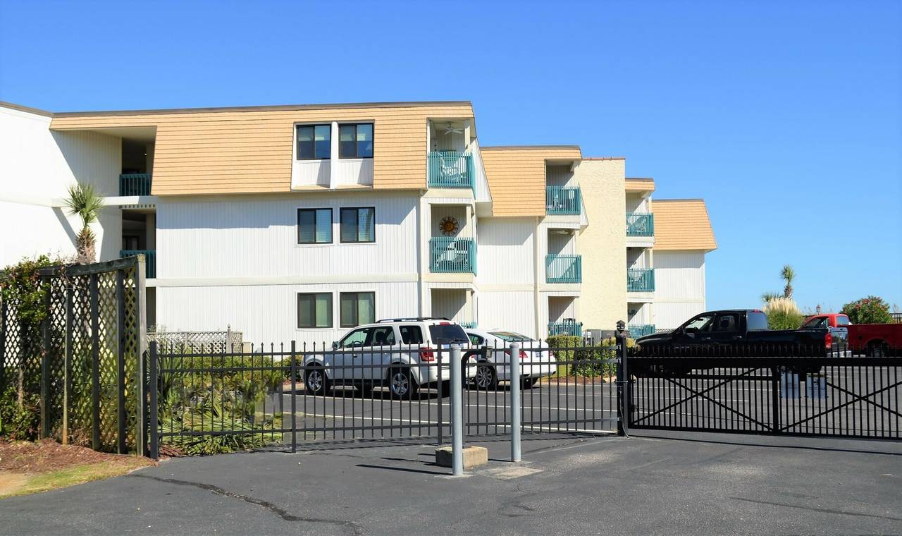 Street Side Exterior with Gated Parking Street Side Exterior with Gated Parking