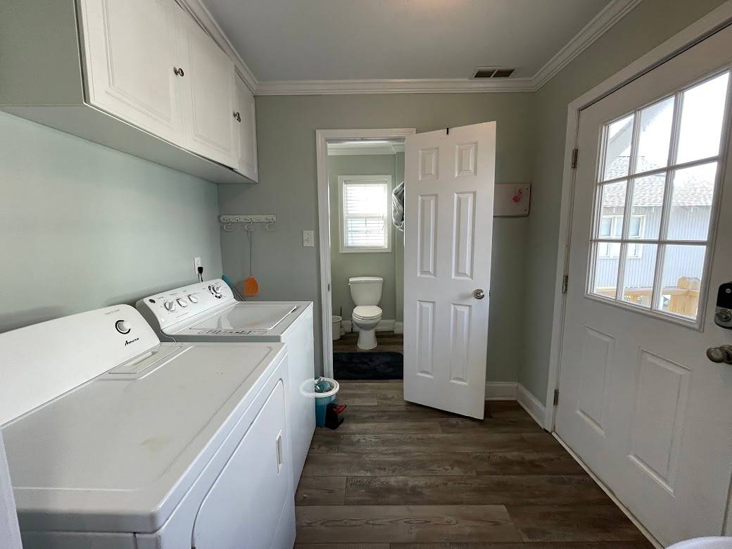 Laundry room (off of down bathroom and kitchen with access to rear entry) Laundry room (off of down bathroom and kitchen with access to rear entry)