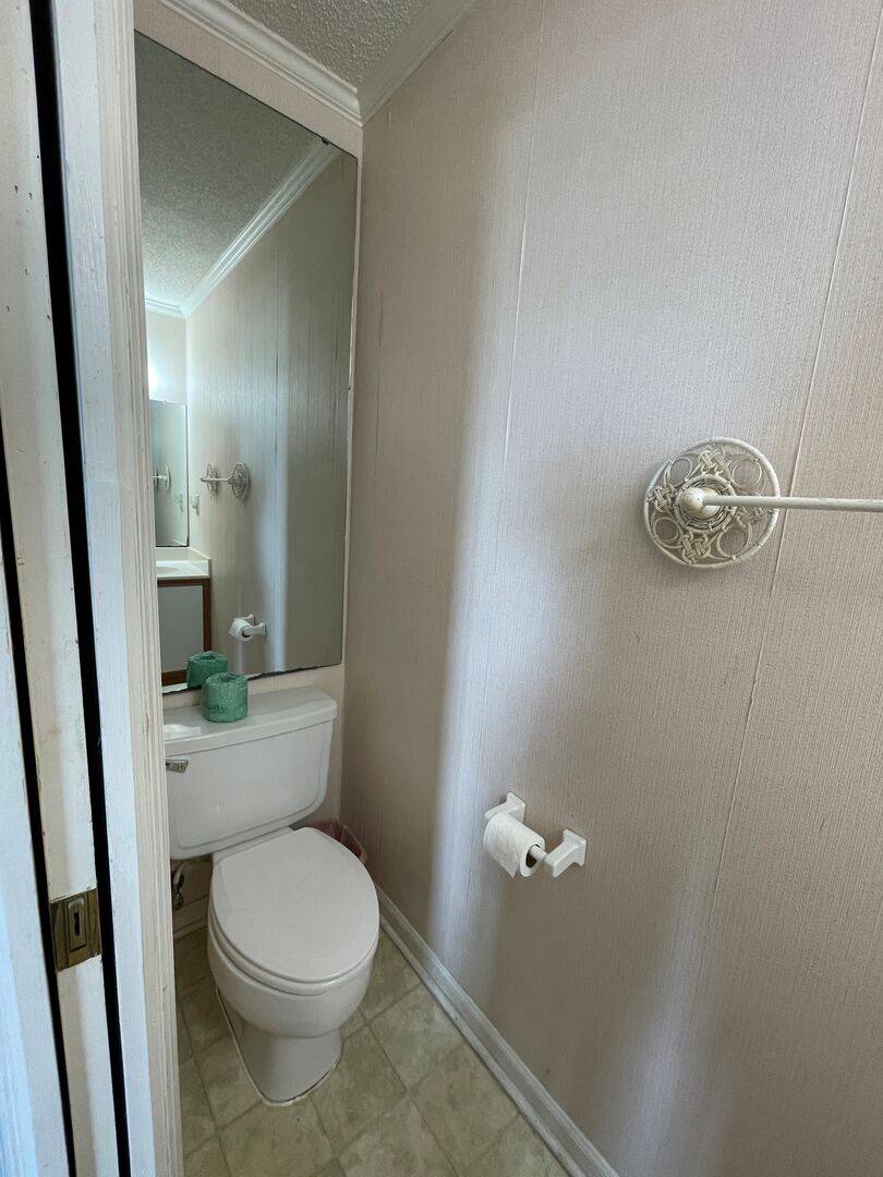 Half bath off of bedroom 1 Half bath off of bedroom 1