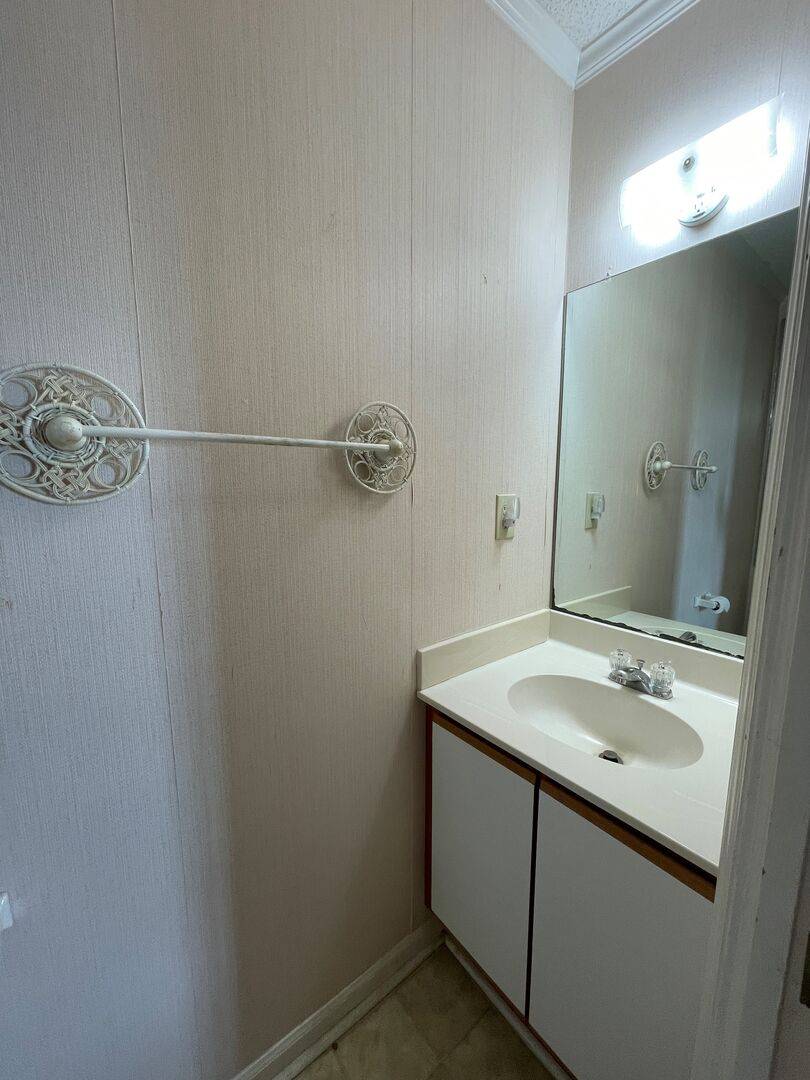 Half bath off of bedroom 1 Half bath off of bedroom 1