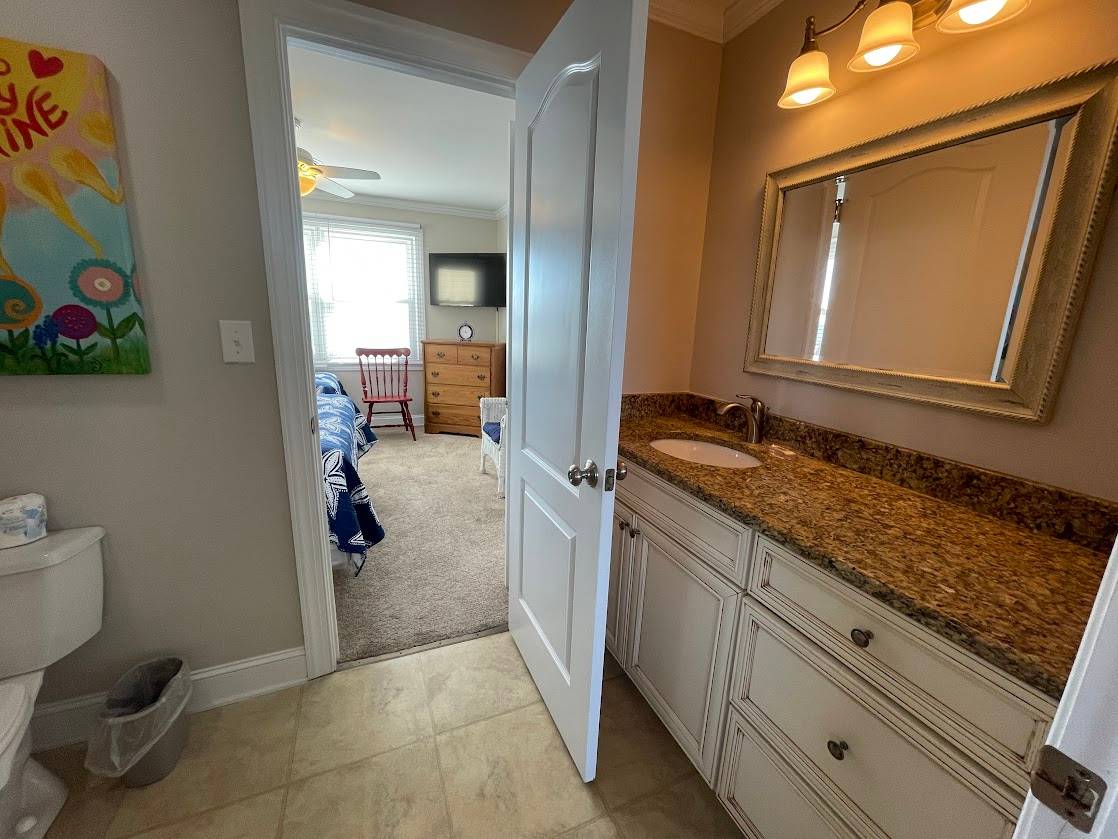 Shared bath between bedrooms 3 and 4 Shared bath between bedrooms 3 and 4