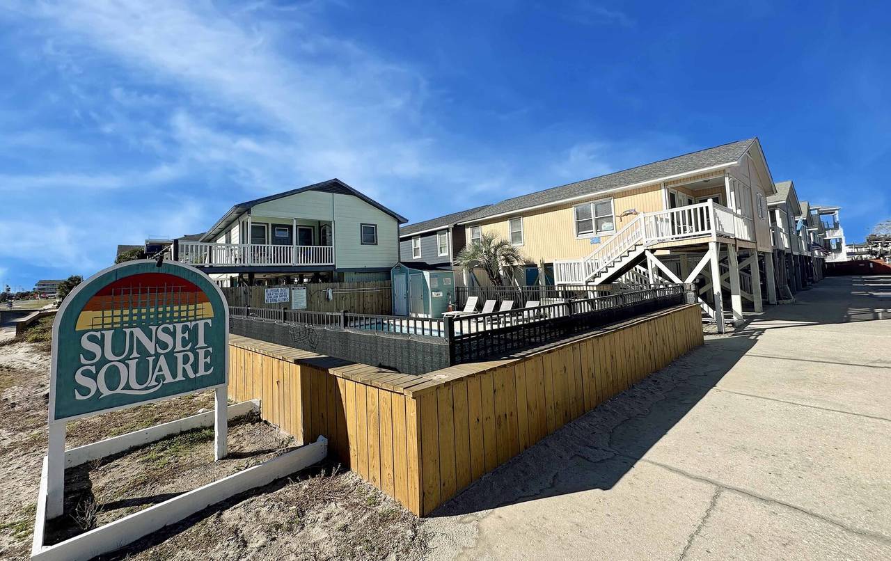 Sunset Square is a complex of 17 homes. Sunset Square is a complex of 17 homes.