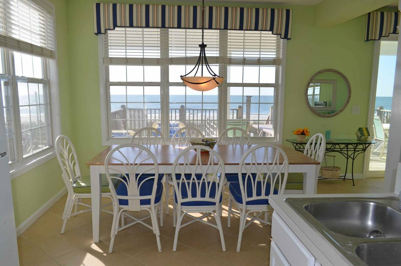 Larger dining room table seats 8 easily Larger dining room table seats 8 easily