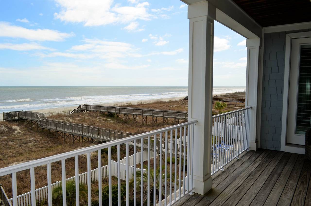 Step out onto the covered porch and feel the ocean breeze! Step out onto the covered porch and feel the ocean breeze!