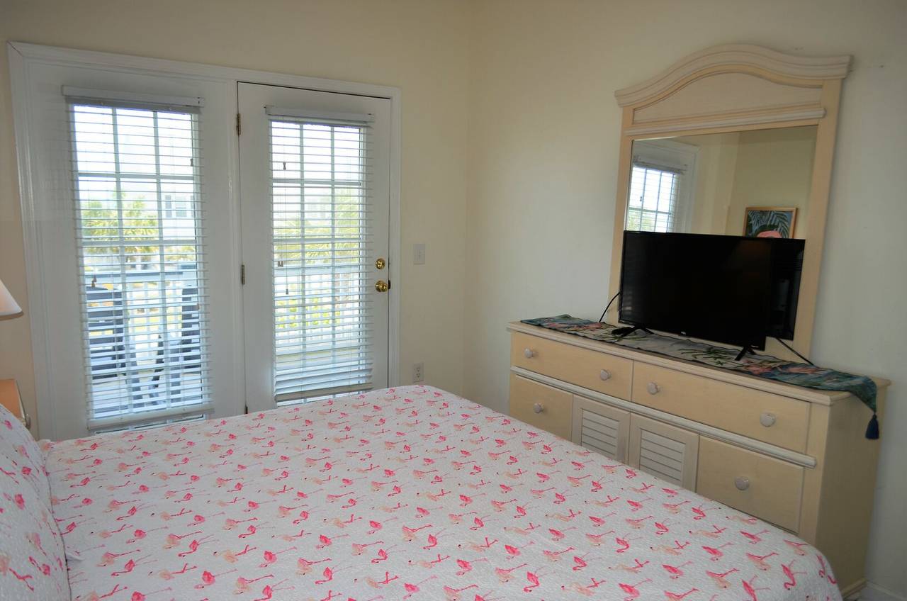 Bedroom 3 TV and porch access Bedroom 3 TV and porch access