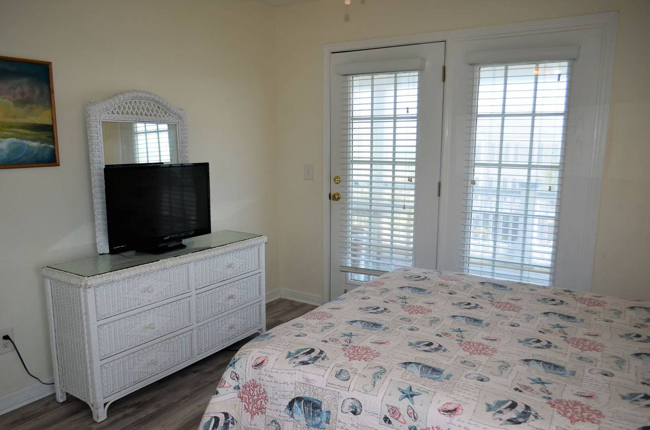 Bedroom 6 TV and porch access Bedroom 6 TV and porch access