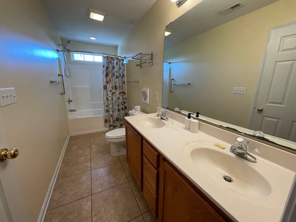 Private bath off of bedroom 5 Private bath off of bedroom 5