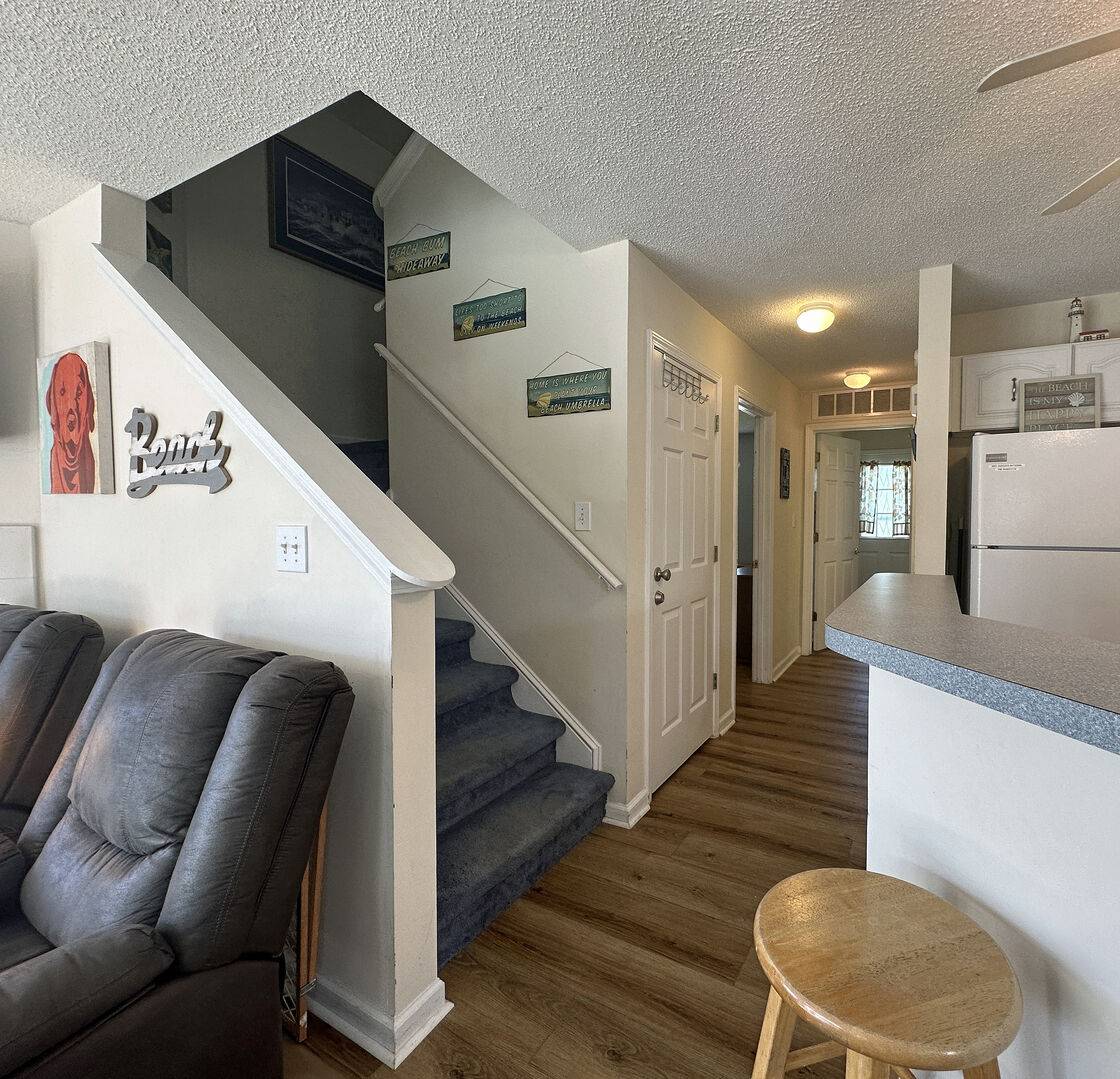 Hallway to entrance (daybed), hall bath & bedroom 1. Hallway to entrance (daybed), hall bath & bedroom 1.