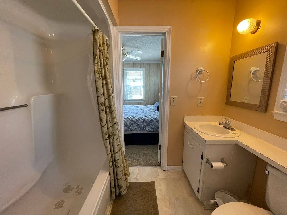 Shared bath between bedrooms 2 and 3 Shared bath between bedrooms 2 and 3