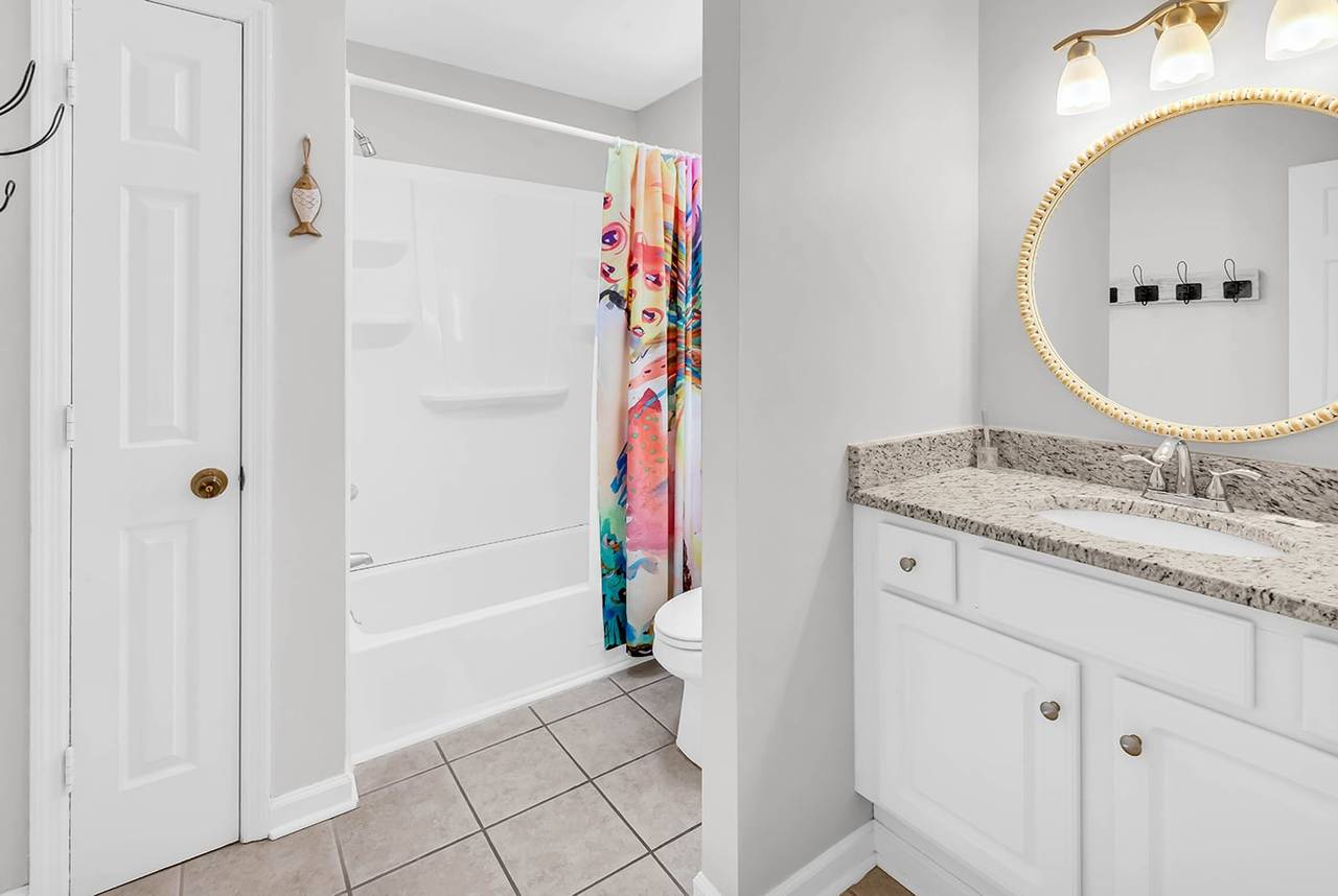 Downstairs hall bath with shower/tub combo Downstairs hall bath with shower/tub combo