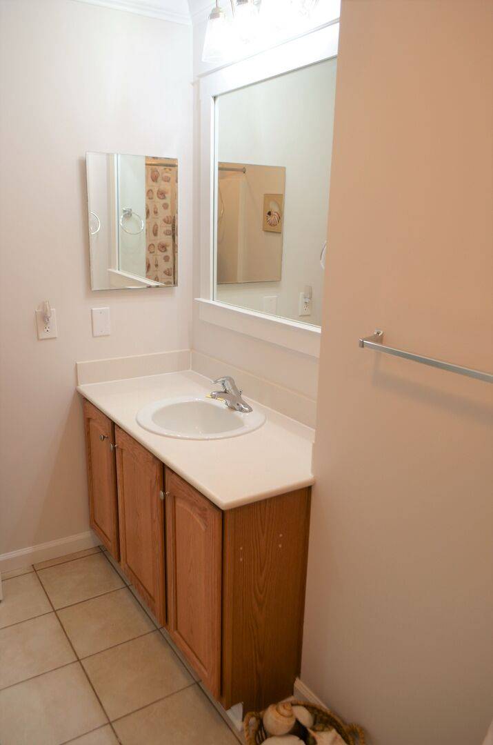 Upstairs hall bathroom features a single vanity & Upstairs hall bathroom features a single vanity &