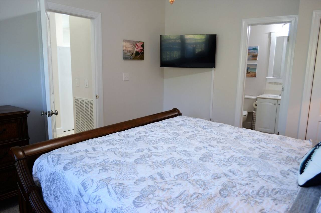 Bedroom 1 features a private bath Bedroom 1 features a private bath