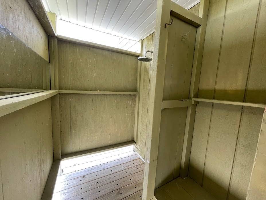 Enclosed outside shower/changing area Enclosed outside shower/changing area